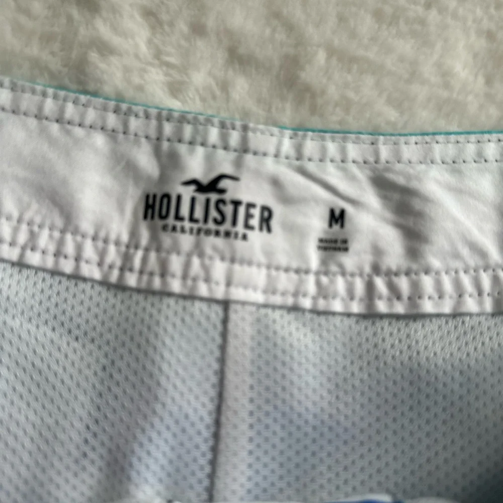 Hollister Teal and Navy Striped Board Shorts